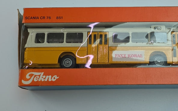 Tekno 851 Scania CR76 Bus "Faxe Koral" Two-Tone yellow and cream, black interior, near mint boxed